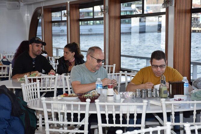 Bosphorus Boat Tour 3 Hour with Asian Side Stop in Istanbul - Dolmabahçe coastline: mosques and the palace that takes over the view