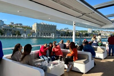 Bosphorus Daytime or Sunset Sightseeing Cruise & Audio Guide - Dolmabahçe Mosque: Ottoman Minarets Right Beside the Palace View