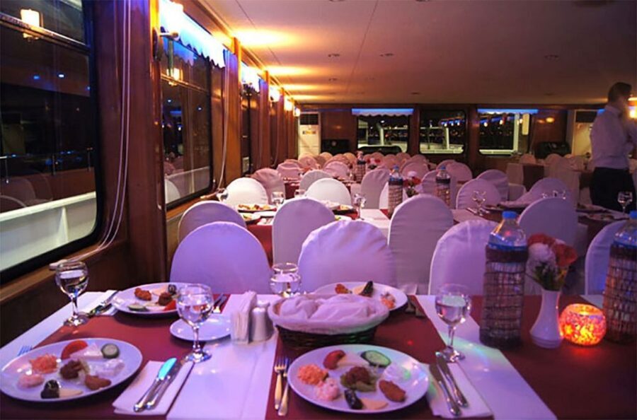 Istanbul Bosphorus Dinner Cruise &Entertainment hotel pickup - The Bosphorus Route at Night: Dolmabahçe, Çırağan, and the Bridge Glow