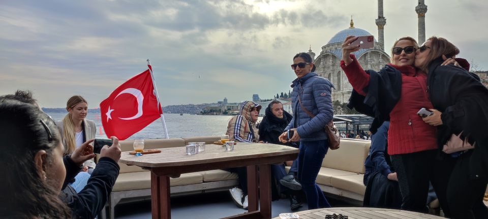 Istanbul: Bosphorus Sunset Cruise on Yacht with Live Guide - Asian side landmarks: fortresses, palaces, and a different shoreline mood