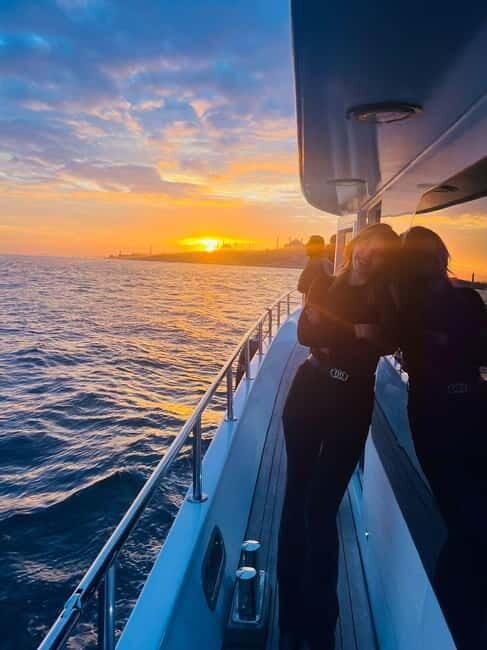 Istanbul: Bosphorus Sunset or Night Yacht Cruise & Transfers - Sunset vs Night on the Bosphorus: guide on one, violinist on the other