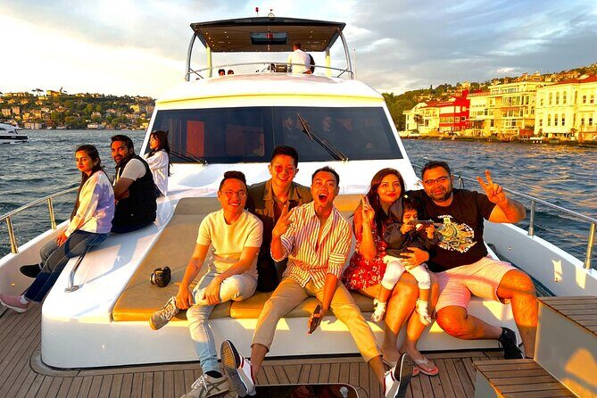 Istanbul Bosphorus Sunset Yacht Cruise With Live Guide And Snacks - First big sights: Bosphorus Strait and Dolmabahçe Palace from the water