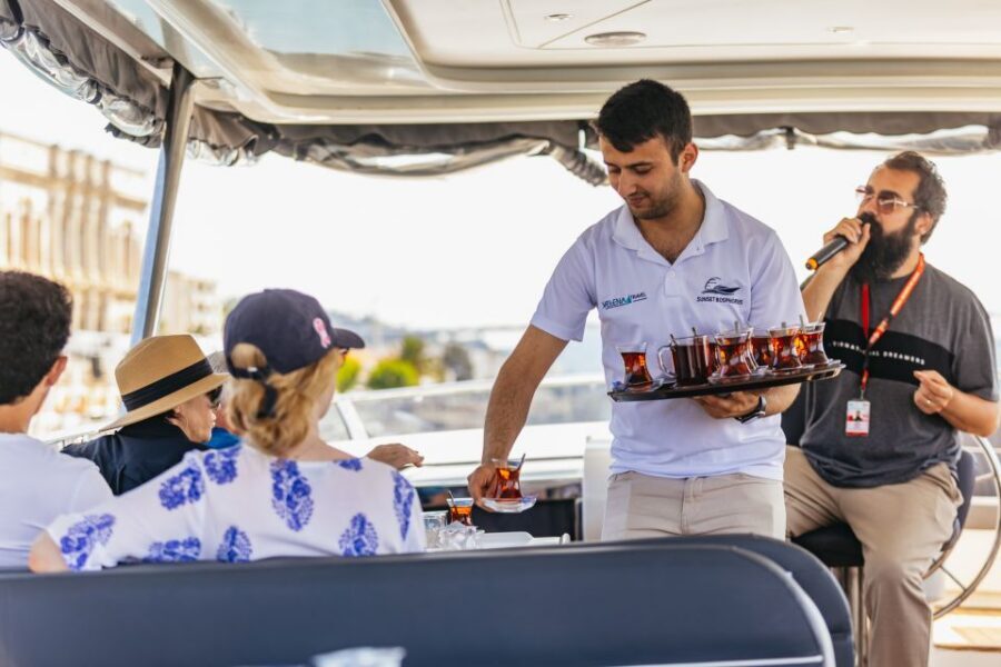 Istanbul: Bosphorus Yacht Cruise with Stopover on Asian Side - What onboard feels like: comfort, snacks, and a guide with timing